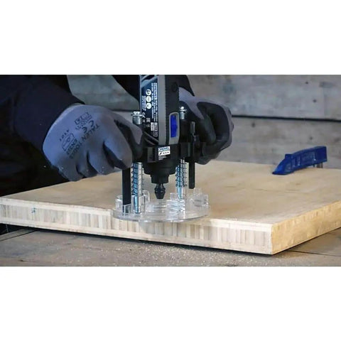 Compact Plunge Router Attachment For Dremel Rotary Tool in use cutting wood with adjustable depth up to 1.875 inches