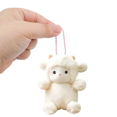 Hand holding plush toy with 100 Pcs Metal Ball Bead Chains 4.72 Inch Adjustable Keychain Beaded Chains With Connectors For DIY Crafts Pink