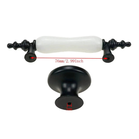 8 Pack Ceramic Drawer Pulls And Knobs Set In Black And White For Kitchen Cabinets And Wardrobes Includes Four Three Hole Centered Handles And Four Single Hole Knobs 126mm Long Handles 76mm Hole Centers Durable Zinc Alloy And Ceramic Construction, showing close-up of white ceramic handle and black knob.