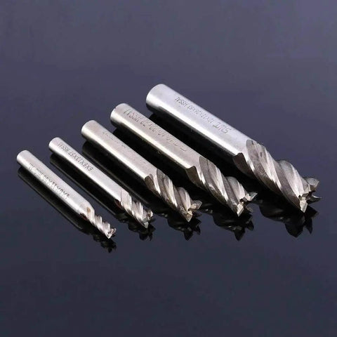 4 Flute HSS End Mill Bits Set For CNC Milling, Straight Shank Cutter Tools in 4mm to 12mm range on black surface