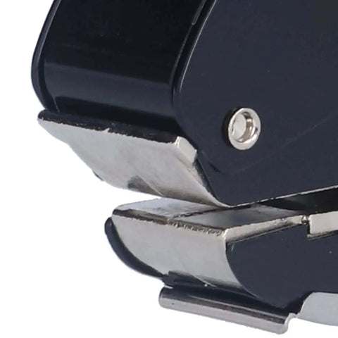 Close-up of heavy duty metal handheld single hole punch tool, showing detail of paper stopper and sturdy construction for up to 10 sheets.