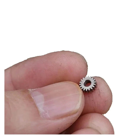 0.3 Module Planetary Gearbox Gear, 5.95mm Diameter, 2.55mm Inner Hole Bore, 18 Teeth held between fingers