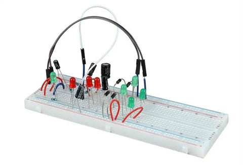 Front view of BOJACK resistor kit on a breadboard with assorted resistors, green LEDs and jumper wires