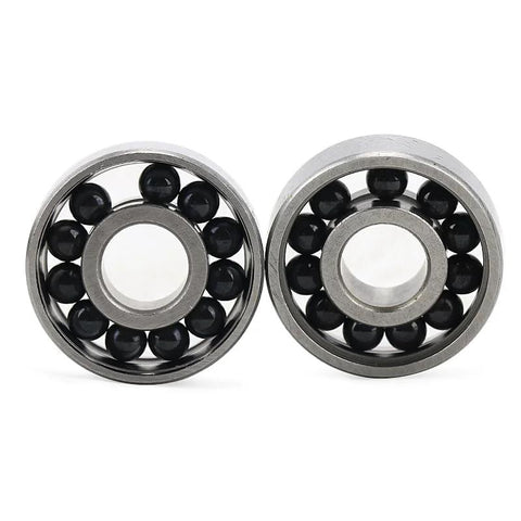 Two 8x16x5mm hybrid ceramic deep groove ball bearings (688CB) with steel outer race and black ceramic balls side-by-side