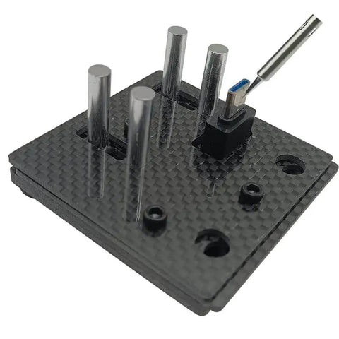 Close-up view of Must Have Carbon Fiber Welding Jig Wire Station With Pocket Hole For XT60 XT90 Connectors Soldering Clamp Craft Tool.