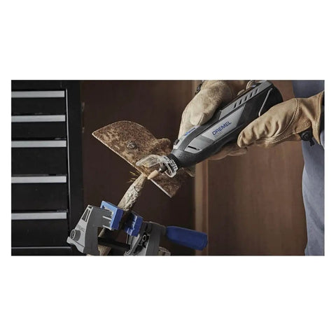 Person using 12V Lithium-Ion Cordless Rotary Tool With Brushless Motor, Variable Speed, 3.0Ah Battery, Includes 5 Accessories on metal
