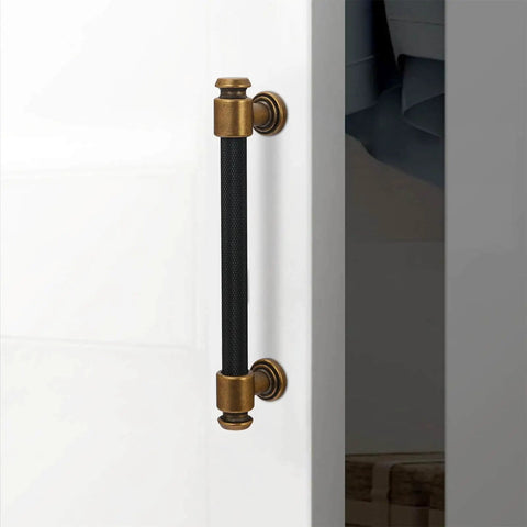 Five Inch Knurled Cabinet Pulls In Black And Antique Brass, 10 Pack For Kitchen Cabinets installed on white cabinet