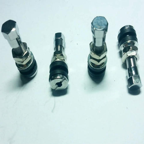 Four silver stainless steel tire valve stems with black rubber seals for tubeless tires