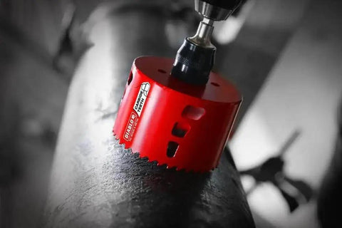 40 Percent Deeper Holes In One Pass Carbide Teeth Hole Saw For Wood And Metal With Snap Lock Plus Mandrel System And Tool Free Plug Ejection Two And Three Quarters Inch Diameter And Two And Three Eighths Inch Cutting Depth DHS2750CT Diablo drilling metal surface