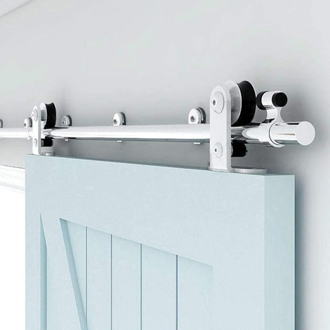 9.6Ft Top Mount Sliding Barn Door Hardware Kit In Satin Brushed Stainless Steel, installed on a door, showing track and rollers.