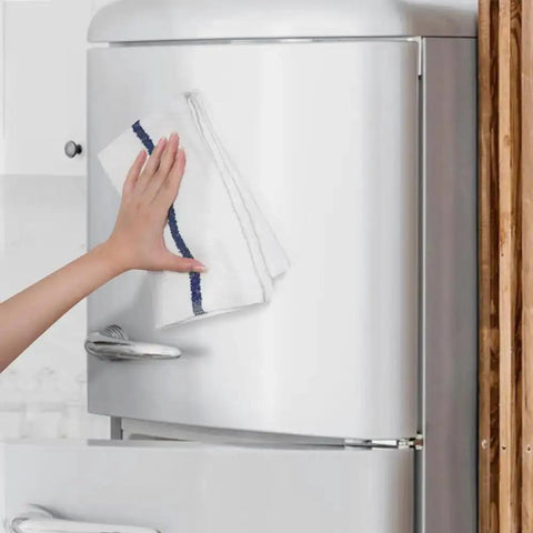 Hand cleaning fridge with Bar Mop Towels Value Pack Of 60 16x19 Inches Absorbent And Durable Cleaning Rags For Home Or Shop.