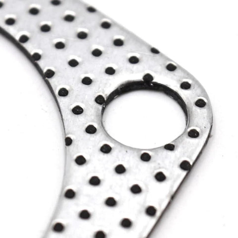 Exhaust gasket, 2.5-inch, 3-bolt flange; graphite with steel reinforcement, perforated metal close-up