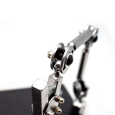 Close-up of clamp mechanism on Universal Welding Fixture With Third Hand Soldering Station Jewelry Clamp And Double Head Weld Jig Rebound