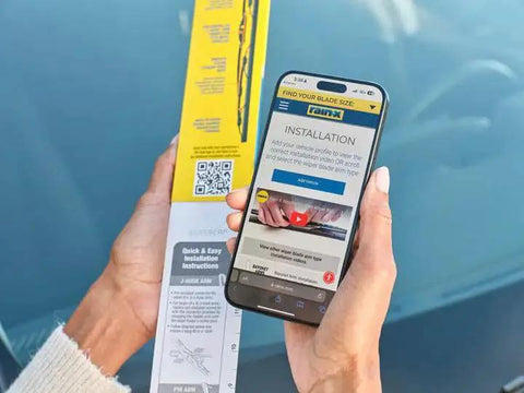 Person holding packaging and mobile showing installation guide for WeatherBeater 22 Inch Wiper Blades Pack of 2 With OEM Quality Durability.