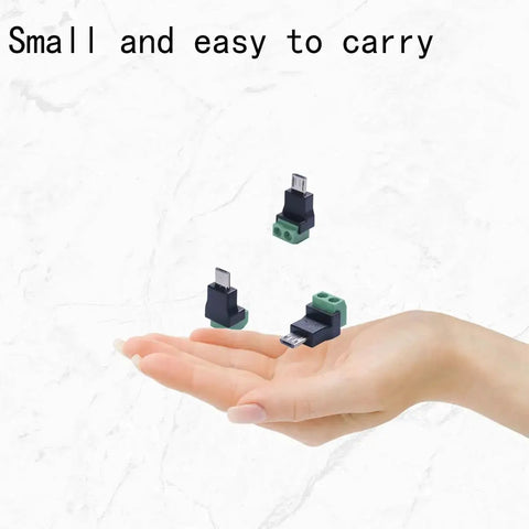 Hand holding Micro USB 2Pin Solderless Charging Connector Crimp Adapter 5V 3A No Data Transfer for DIY Repair No Soldering Required