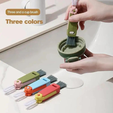 Person using 3 In 1 Cup Lid Gap Cleaning Brush For Bottles And Mugs Crevice Cleaner in green, red, and blue color on a lid