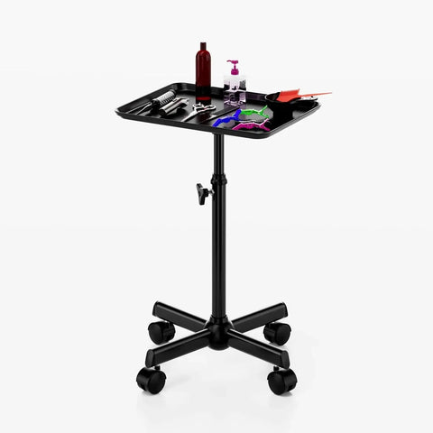 Adjustable Height Rolling Salon Cart With Tray On Durable Wheels For Tattoo Parlors Spas Dental Clinics And Hair Stylists Built From Corrosion Resistant Iron And Aluminum Anti Tip Design Lockable Casters Stable Mobile Workspace Black, shown with tools and supplies on tray.