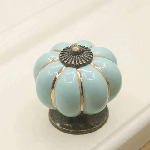 Sky blue ceramic pumpkin knob from 5 Pack Retro Vintage Ceramic Pumpkin Cabinet Knobs Set For Kitchen Cabinets Drawers Dresser Cupboard Pull Handles Includes 3 Kinds Of Screws Sky Blue Enhances Vintage Charm For Furniture With Easy Install And Durable Gloss Finish