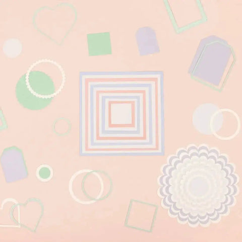Assorted die shapes including scalloped circles, squares, and hearts, from Mini Die Set For Scrapbooking And Card Making - 7 Scalloped Circle Dies
