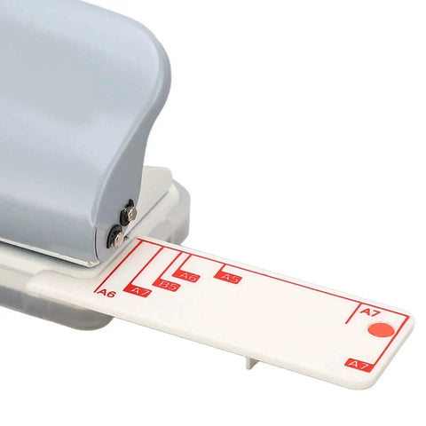 3 Hole Puncher For Loose Leaf Paper Portable Handheld Punch With Metal Build And Positioning Ruler 5 Sheet Capacity close-up