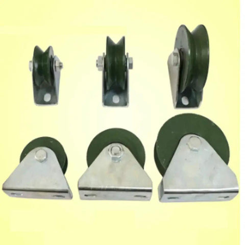 Assorted sizes of Workhorse Heavy Duty Cast Iron V Groove Caster Wheel With Double Bearings for industrial use, front view.