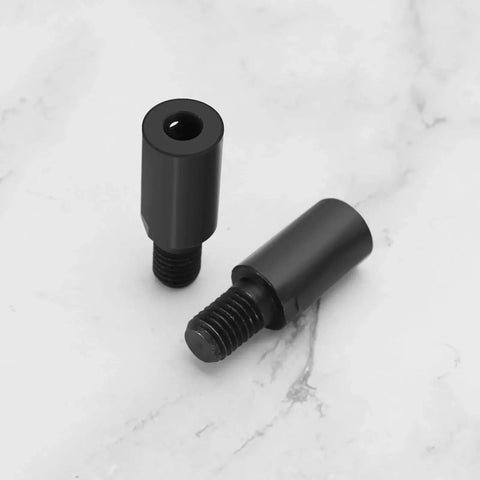 Front and side view: two black metal M10 6mm blade sleeve adapters for angle grinder with threaded ends