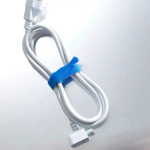 Coiled power cord secured with One Wrap Cable Ties For Easy Cable Management Self Gripping Reusable Wire And Cord Organizer 8 Inch