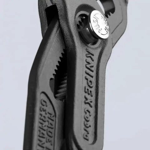 Close-up of Cobra Water Pump Pliers, 5 Inch, Red, Adjustable Pliers With Self-Locking Teeth, 13 Positions, Pinch Guard For Safe Operation