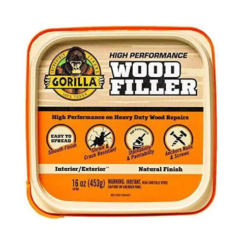 All Purpose Wood Filler Natural Finish 16 Oz Water Resistant Indoor Outdoor Use in a tub, designed for wood repairs.