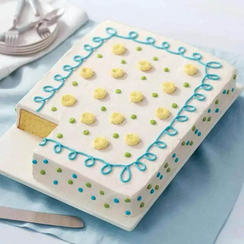 Decorated sheet cake on a platter made in an Extra Large 11 X 15 Inch Aluminum Baking Sheet Pan With 2 Inch Deep Sides For Even Heating