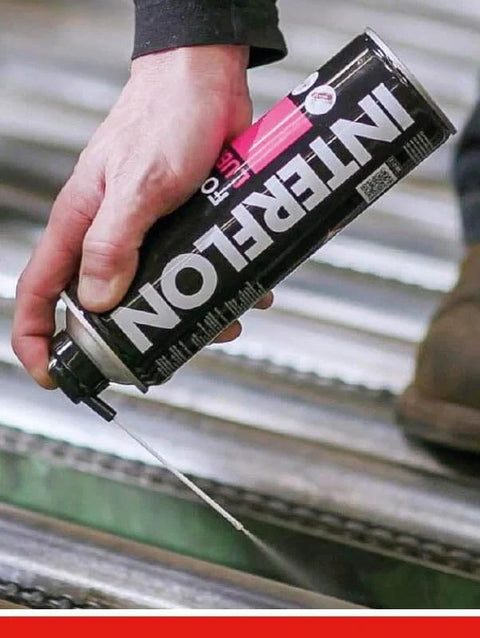 Hand using NSF H1 Food Grade Dry Film Lubricant For Food Processing Equipment Multipurpose Aerosol Can 500ml on machinery parts