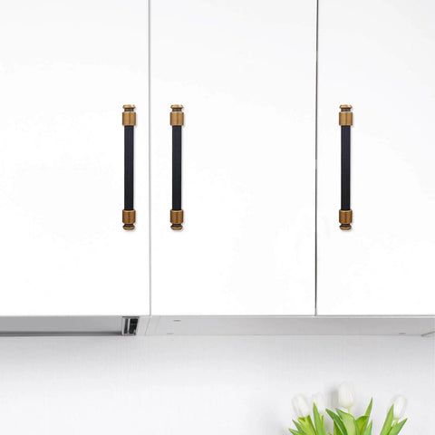 10 Pack 5 Inch Black And Antique Brass Kitchen Cabinet Handles Knurled Cabinet Pulls installed on white kitchen cabinets.