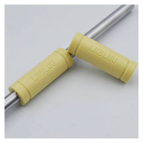 Solid Polymer LM8LUU Linear Bearing Bushing 8x15x45 Mm For 8 Mm Shafts plastic bearings, shown on shafts, side view.