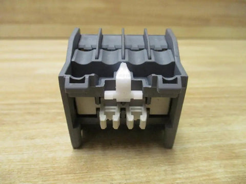 Front view of CA5-22M CA522M Auxiliary Contact Block 2 N.O./2 N.C. front-mount, A-Line series, grey color.