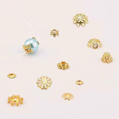 Golden Filigree Flower Bead Caps Set With 240 Pcs 12 Unique Brass Petal Ends shown with beads for jewelry making