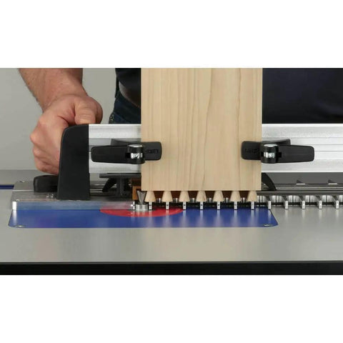 Router Table Dovetail Joinery Jig For Smooth, Stable, Repeatable Dovetail Cuts On Fine Woodworking Projects in use with wood piece