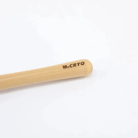Close-up of CryoCut M2 Pro Grade 3/8 Inch Bowl Gouge beech handle, engraved with M2 CRYO logo, for woodturning.