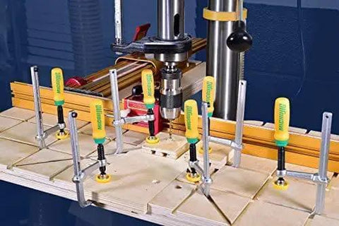 Matchfit Dovetail Clamps Set With Soft Grip Handles Two Piece Two Pack For Precise Routing Fences And Sleds in use on workbench
