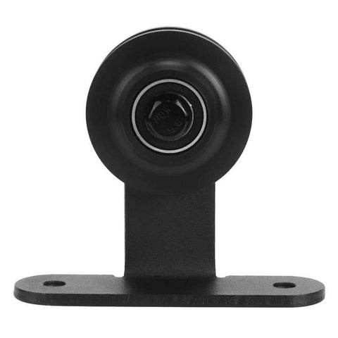 Heavy Duty Sliding Door Hardware Kit With Carbon Steel Hanging Rail Wheel And High Strength Screws For Barn Doors Indoor Outdoor Installation Beefy Performance For Barns Greenhouses Storage Facilities And Industrial Spaces close-up of a black rail wheel component.