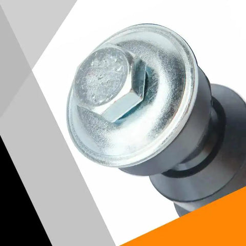 Close-up of front sway bar end link bolt head with metal plate and black mounting bushing.