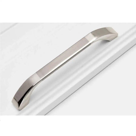 Brushed Nickel Cabinet Handles Three Pack With 64 Millimeter Hole Centers Euro Style Drawer Pulls installed on white surface