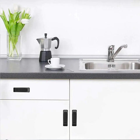Kitchen cabinet with 10 Pack Self Stick Push Pull Helper ABS Plastic Handles, black adhesive handles installed, modern kitchen setting