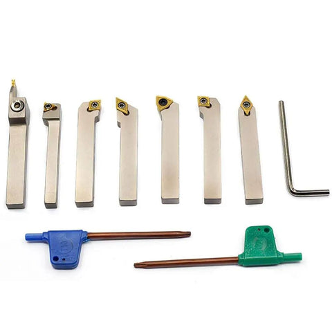 Heavy Duty Lathe Tool Holder Set With One Quarter Inch Shanks Seven Piece Nickel Plated CNC Tools visible with accessories.