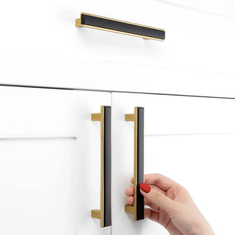Matte Black and Gold Cabinet Pulls Set, 5 Pack, 5 Inch Center-To-Center Two-Tone Hardware installed on white cabinet