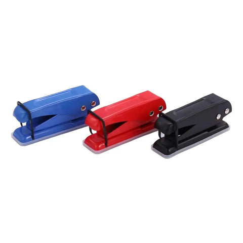 Blue, red, and black staplers arranged in a row on a white background