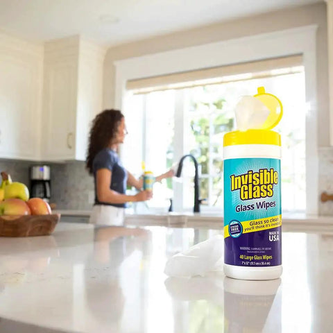 Container of Pack Of 3 Pre-Moistened Glass Wipes, Streak-Free And Lint-Free For Windows on kitchen counter