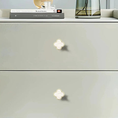 Six Pack White Dresser Knobs Set Featuring Pearl Clover Design With Gold Finish For Cabinets And Drawers on dresser