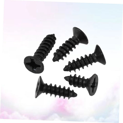 Close-up view of black 100Pcs Self Tapping Screws Flat Head Drywall Fasteners for Wood Gypsum Board against a pastel background