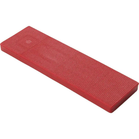 Heavy Duty Plastic Shim Set for Glazing and Wall Coverings, 1.13 In W x 4 In L, 60 Pack, red shim on flat surface.