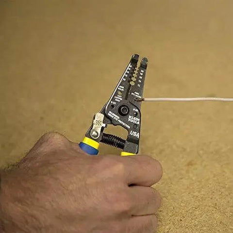 Heavy Duty Wire Cutter And Stripper For 10-18 AWG Solid And 12-20 AWG Stranded Wire With Precision Ground Stripping Holes in use
